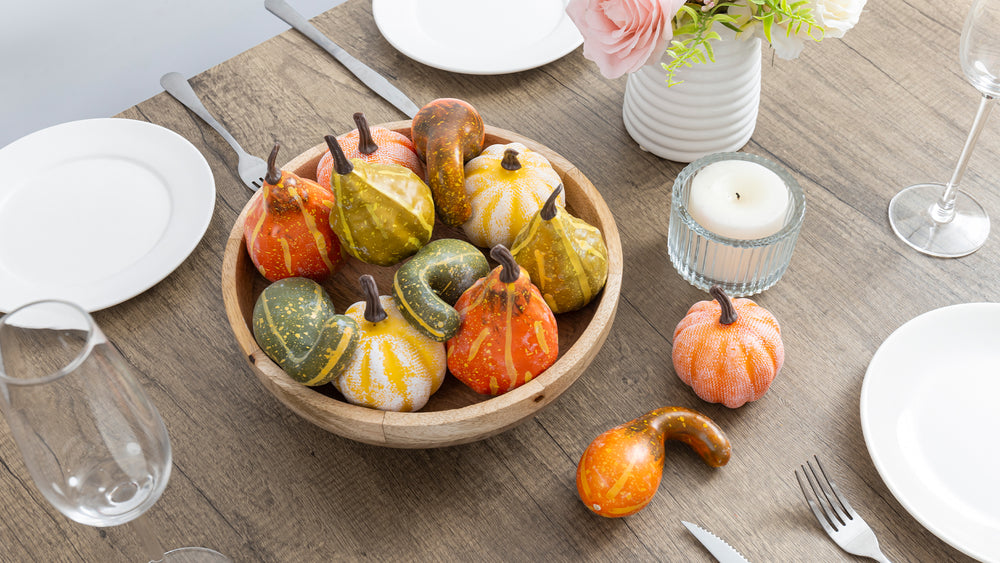 Fall decor faux autumn fruits vegetables in bowl as centerpiece for elegant dining