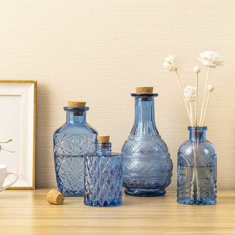 Set of 4, Small Blue Glass Reed Diffuser Bottles, Embossed Apothecary Style Flower Bud Vases with Cork Lids-MyGift