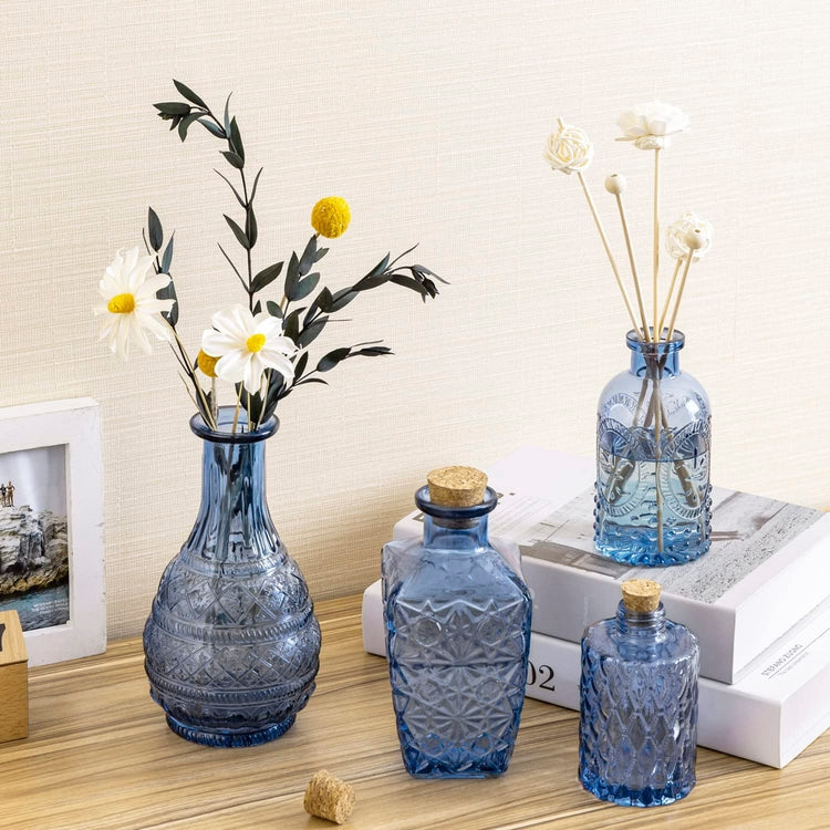 Set of 4, Small Blue Glass Reed Diffuser Bottles, Embossed Apothecary Style Flower Bud Vases with Cork Lids-MyGift
