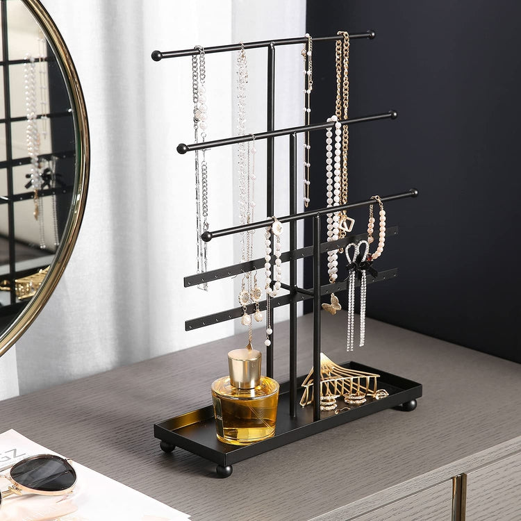 Intricate metal display stand (or similar) placed on jewelry